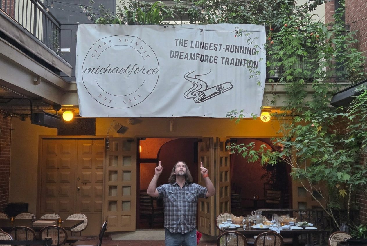 Guests gathered under the Cigar Shindig banner at the courtyard venue